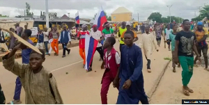 Nigerians Protest With Russian Flag.png