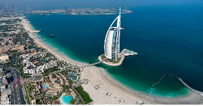 An aerial view of the Burj al-Arab hotel in the Gulf emirate of Dubai / Photo by Karim Sahib / AFP