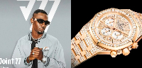 Joint 77 shows off his rose gold watch, which he says costs roughly £15,000