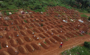Workers are seen at a cemetery in Ituri province, eastern DRC