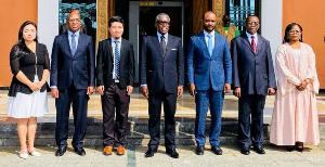 Equatorial Guinea Vice President Obiang Mangue (middle) standing with Chinese investors