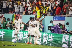 Dede Ayew celebrates scoring Ghana's equalizer