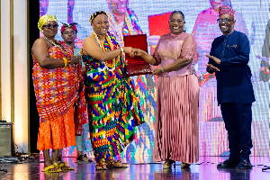 Deputy Chief of Staff, Nana Oye recieving the award on behalf of President Mahama