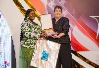 Eloina Baddoo receiving AmCham award