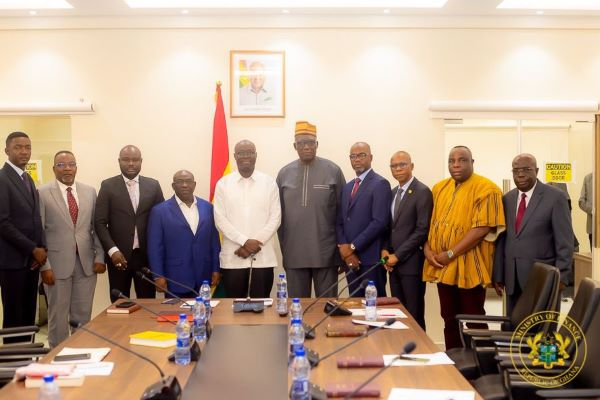 Ato Forson with the newly inaugurated board members of ADB