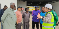 EAC lawmakers receive a briefing from contractors during inspection of  Arusha Pamoja AFCON stadium