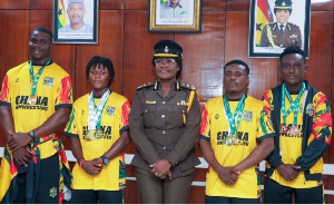 The Gold medalists with the D-G of the Ghana Prisons Service (middle)