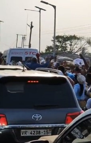 Mahama waving at traders in Sogakope