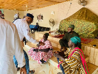 Alhaji Sinare speaking with some chiefs