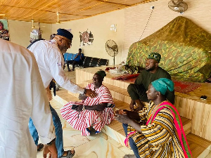 Alhaji Sinare speaking with some chiefs