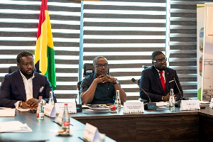 BOST MD Afetsi Awoonor (L), Energy Minister John Jinapor (M) and Board Chair Prof Saint Kuttu (R)