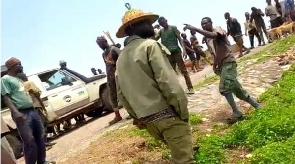 Officers of the Game and Wildlife Department of the Forestry Commission captured in a photo