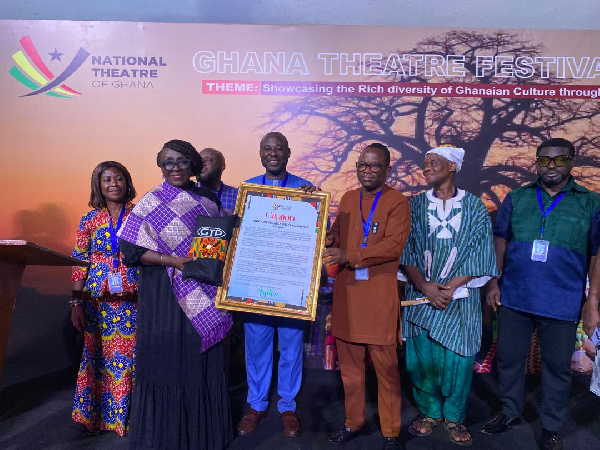 Creative Arts Minister, Abla Dzifa Gomashie with some National Theatre staff