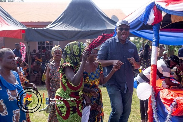 Dr. Nana Ayew Afriye dancing with some elders at the event