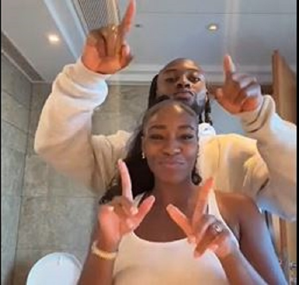 Antoine Semenyo (behind) spotted dancing with his girlfriend