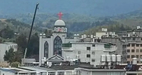 Local authorities have started taking down part of Yayang Church's building