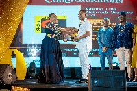 Nick Danso Adjei receiving the award