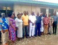 A group picture of Robert Wisdom Cudjoe and members of the council