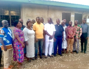 A group picture of Robert Wisdom Cudjoe and members of the council