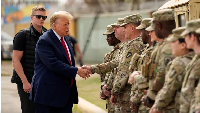 US President-elect Donald Trump greets members of the National Guard on the US-Mexico border