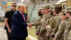 US President-elect Donald Trump greets members of the National Guard on the US-Mexico border