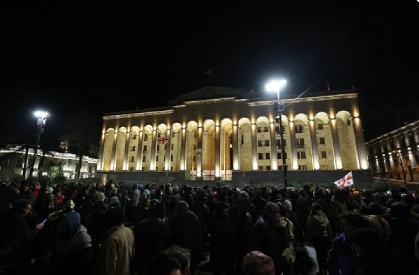 Georgian antigovernment demonstrators rally outside the parliament in the capital Tbilisi on Feb. 3