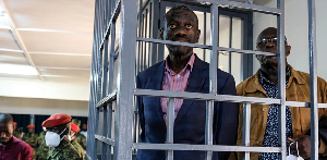 Ugandan opposition leader and four-time presidential candidate Kizza Besigye, stands in the dock Ugandan opposition leader and four-time presidential candidate Kizza Besigye, stands in the dock