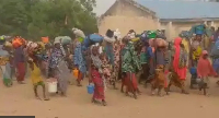 Some villagers carry dia bolongings as them commot