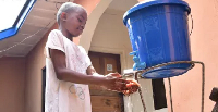 A child washing his hands