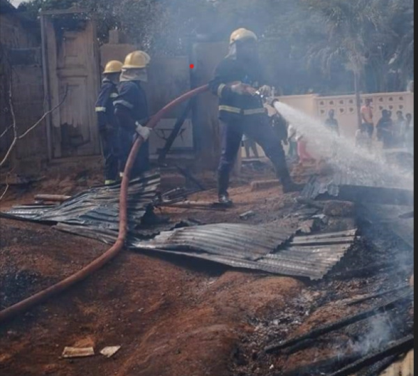 Fire fighters from the Amasaman fire station helping fight the blaze