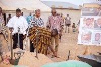 NUGS president breaking ground for the construction of classroom block in Kanania