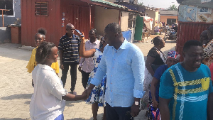 Patrick Boamah interacting with some of his constituents