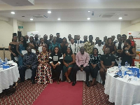 National Service Personnel in a group photograph with staekholders at the dinner night
