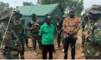 John Kwadwo Gyapong in green lacoste, is the Oti Regional Minister