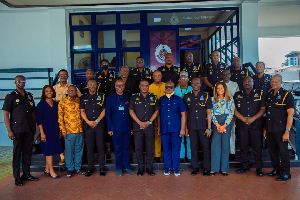 IGP in a group photograph with stakeholders after a meeting