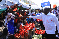 Dr. Mahamudu Bawumia interacting with some of the markets women