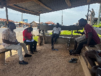 Some of the PURC staff engaging some of the community members