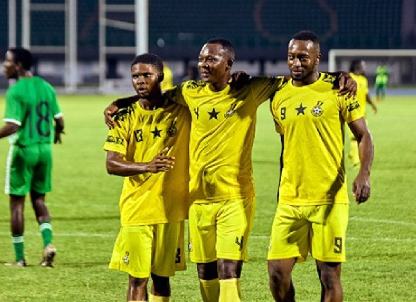 Players celebrating a goal