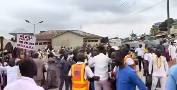 The demonstrators held placards with various inscriptions