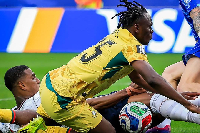 Prince Adu burst into the box before Konsa came across and brought him down