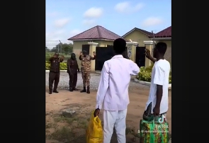 The two men waving their goodbyes to the prison officers after they were released