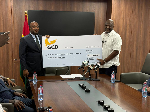 Dzata Group Holdings CEO, Ibrahim Mahama (R) with Deputy Finance Minister Thomas Nyarko Ampem (L)