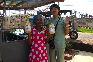 The Japanese volunteer with one of the beneficiaries