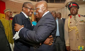 An old photo of Alban Bagbin and President Akufo-Addo in a warm embrace