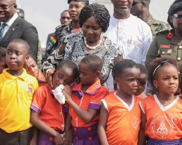 Prof Naana Jane comforting the school pupil who was overwhelmed with emotion
