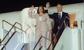 Kamala Harris and Second Gentleman wave as they disembark from Airforce 2