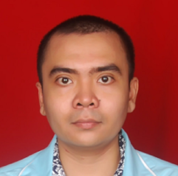 Writer, Dr Tomy Michael