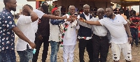 NDC parliamentary aspirant for Asawase constituency,  Dr. Williams Atta Owusu with his supporters