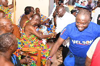 Dr Mahamudu Bawumia (in white) shaking hands with one of the chiefs