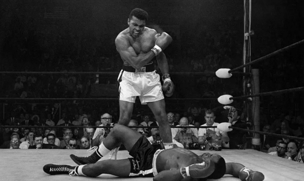 Muhammad Ali stands over Sonny Liston after a knockout punch